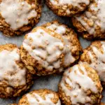 Soft and chewy spiced chocolate chip cookies with melted dark chocolate chunks and a sprinkle of sea salt.